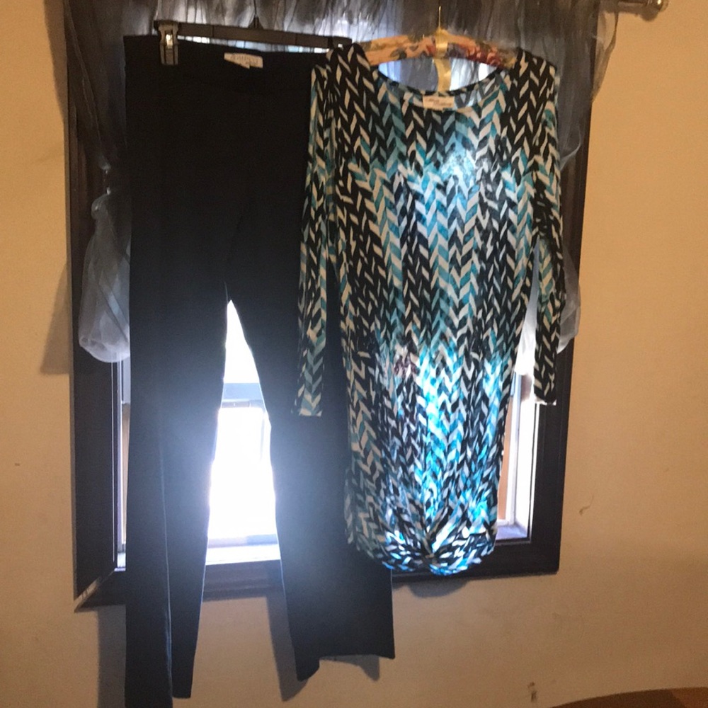A blouse and stretch pants.